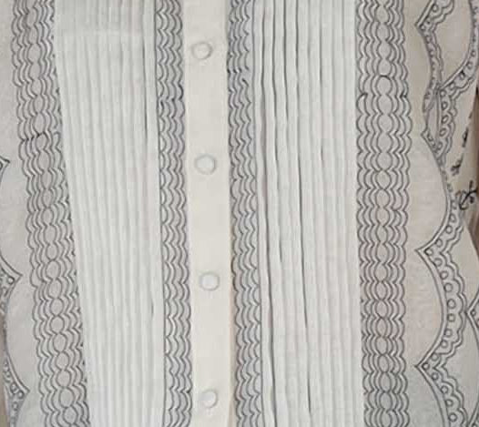 Fine tucks and embroidery