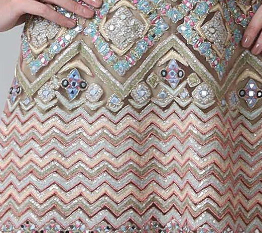 Mirrors and zigzag embroidery