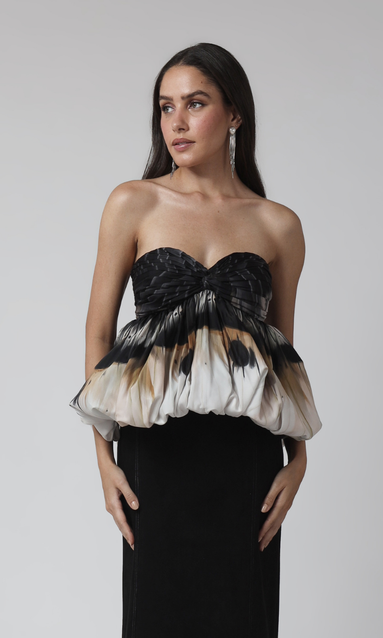 A sculpted peplum