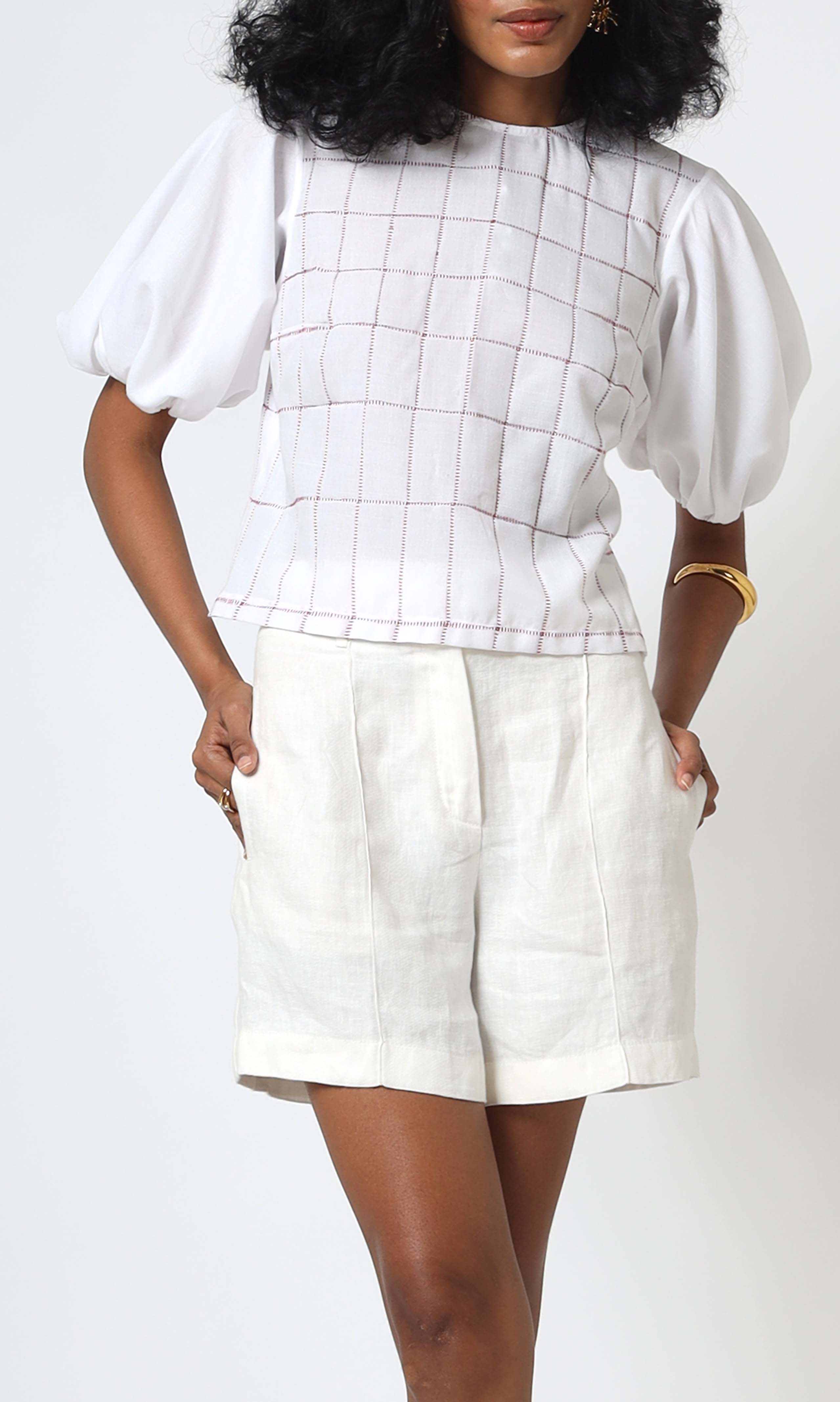 Puff sleeves and check