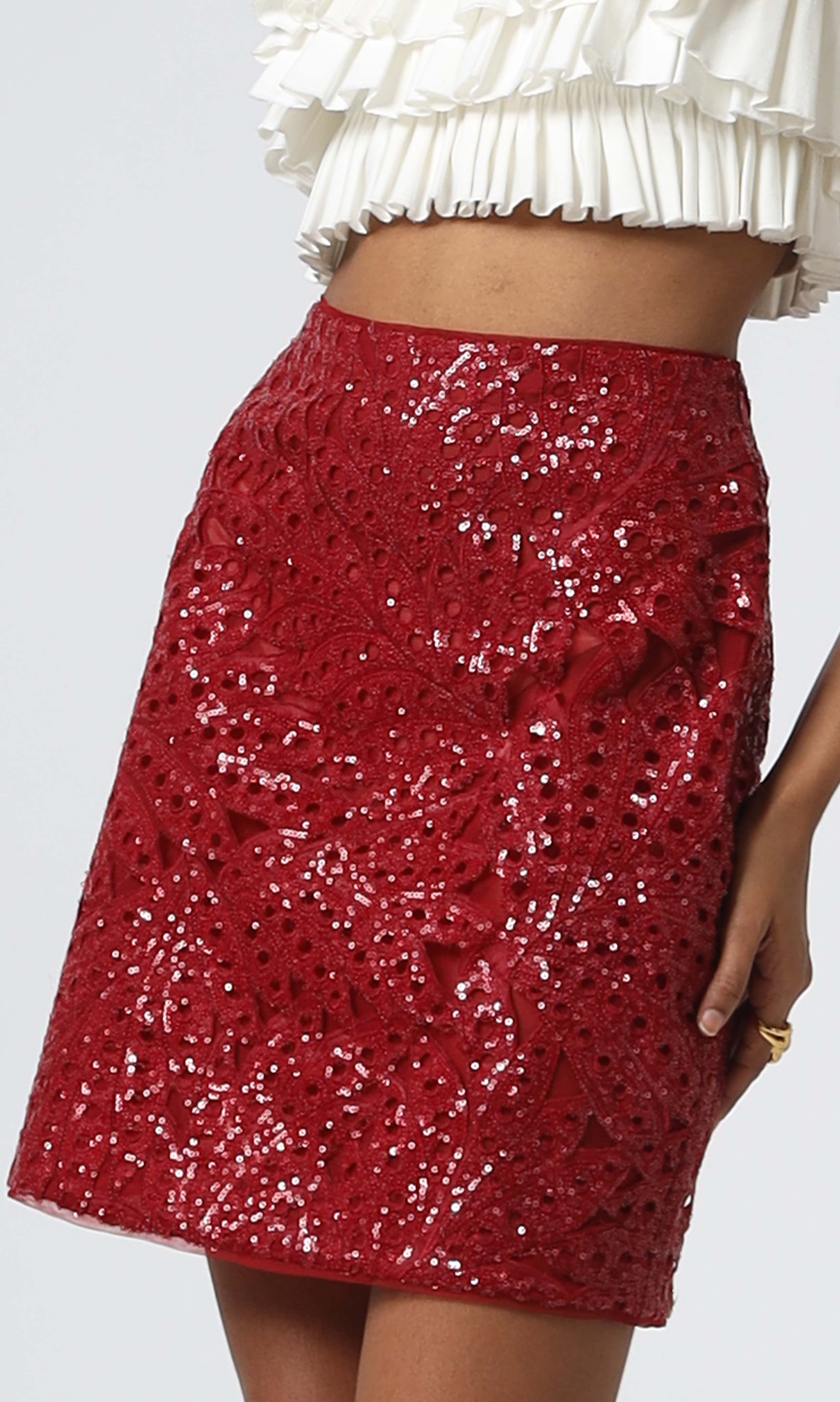 Sequins on red